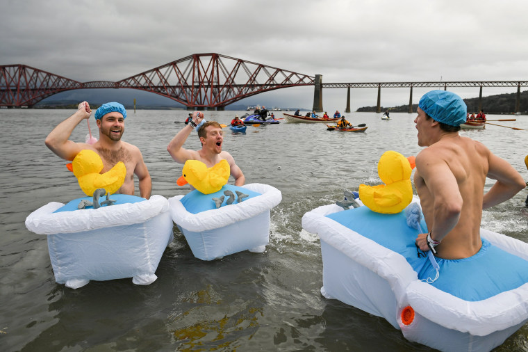 Image: New Year's Day Bathers Take Part In The Loony Dook Swim