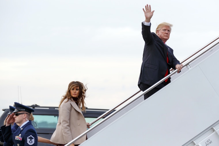 Image: Trump and first lady Melania Trump board Air Force One