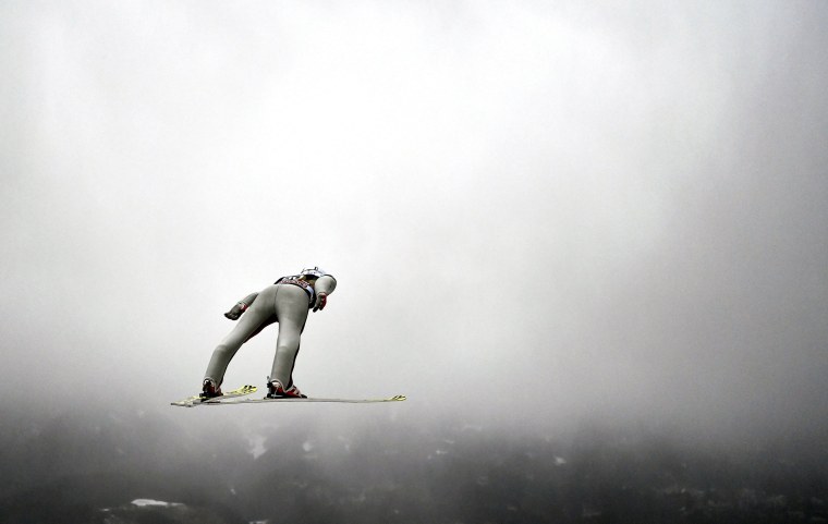 Image: Anders Fannemel of Norway is airborne during a practice round