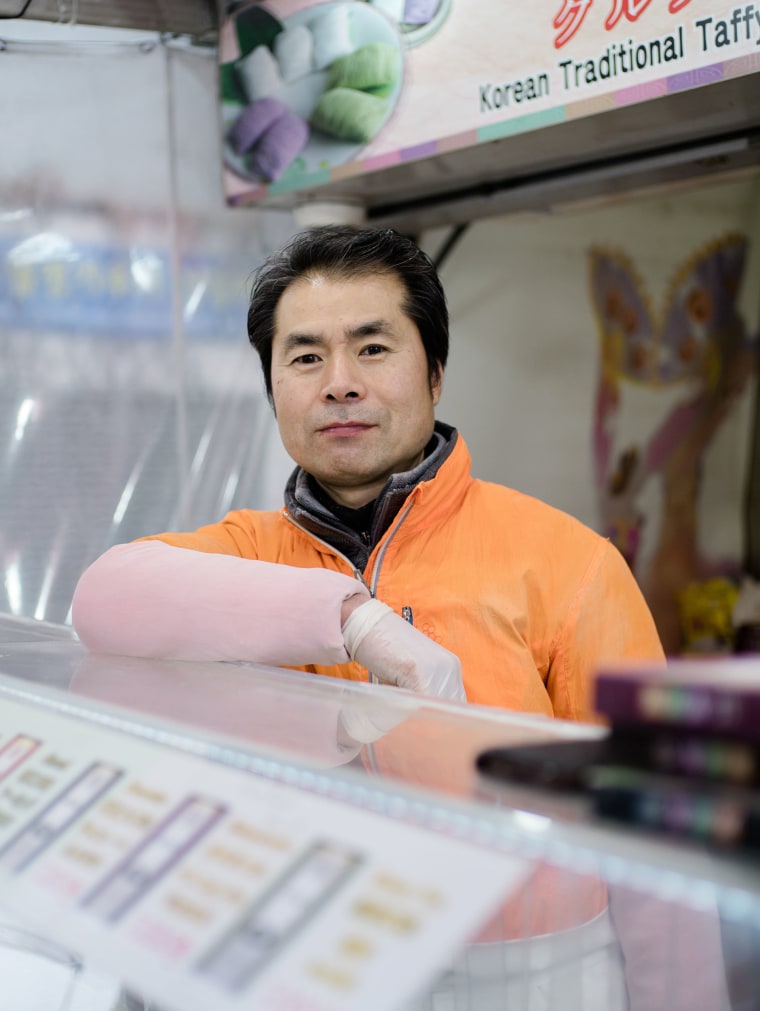 Image: South Korean candy vendor Go Young Ho, 50, hopes for a thaw in relations between North Korea, South Korea and the United States during the 2018 Winter Olympics.