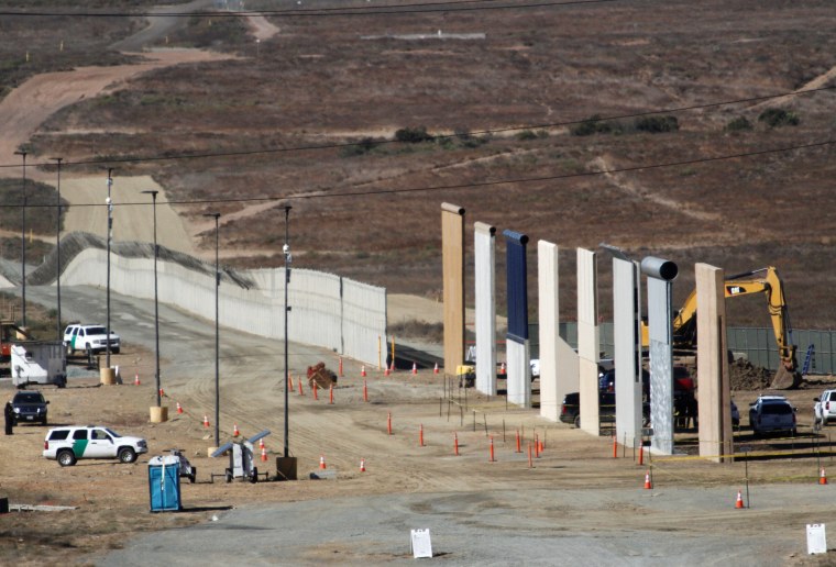 Image: Prototypes for U.S. President Donald Trump's border wall with Mexico are shown near completion in this picture taken from the Mexican side of the border, in Tijuana