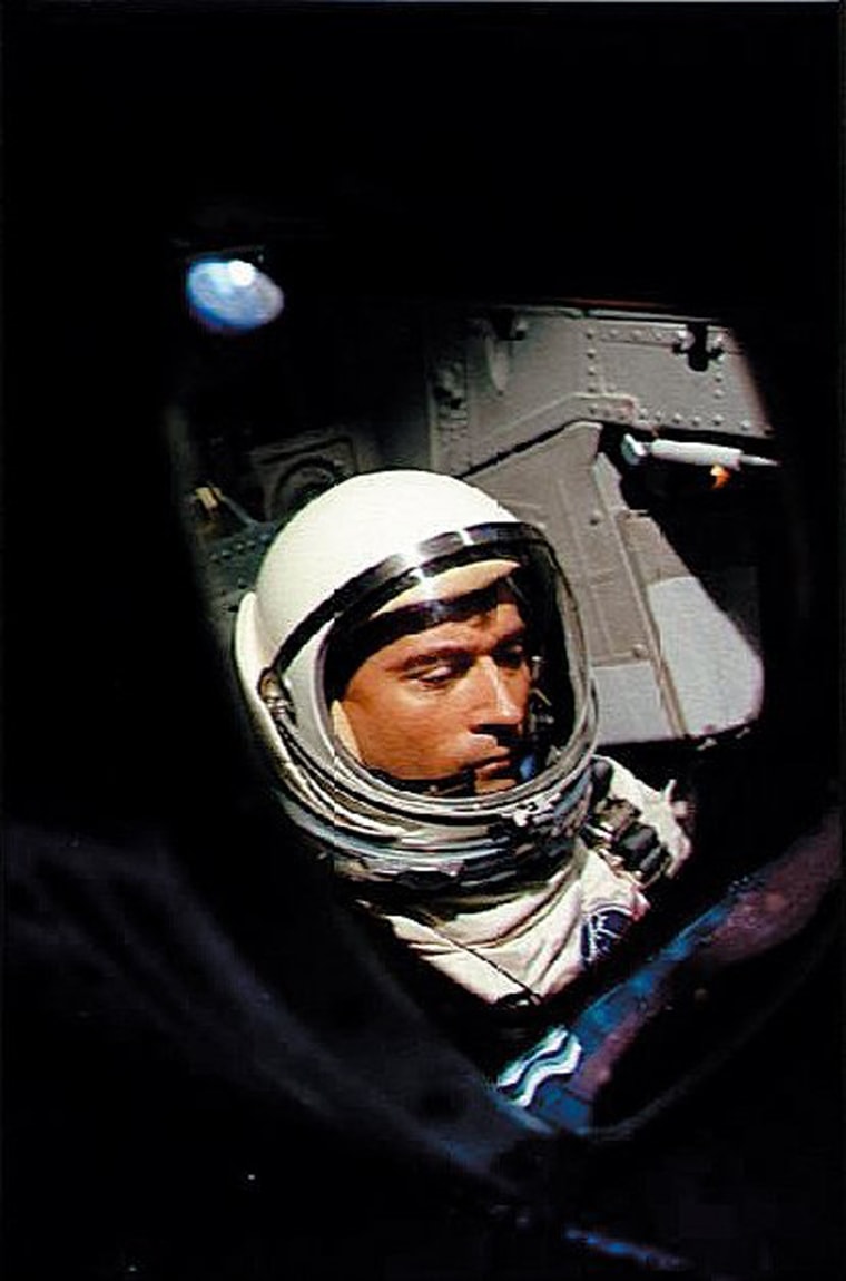 Image: U.S. astronaut John Young aboard Gemini III waiting for the launching of the first orbital maneuver by manned spacecraft on March 23, 1965.