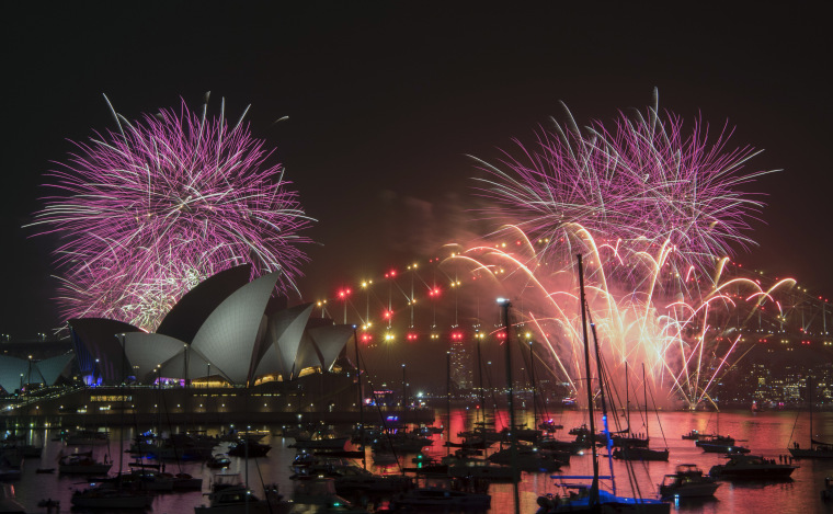 Image: Fireworks explode over the Sydney during New Year's Eve celebrations