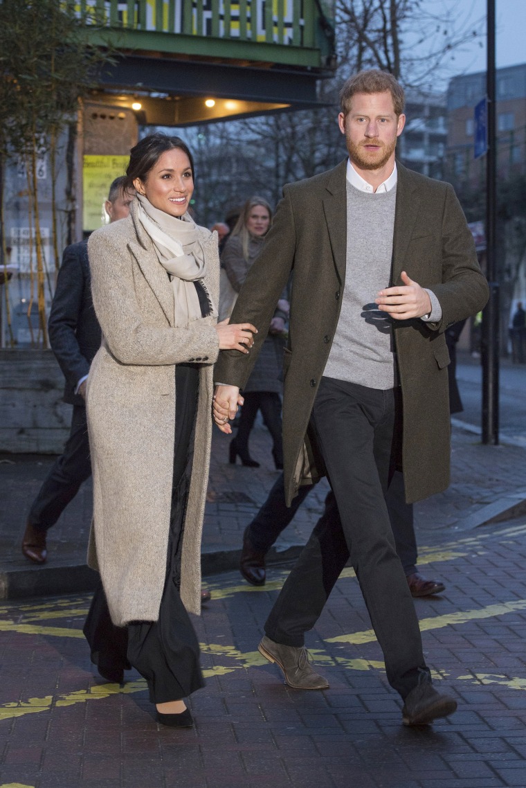 Meghan Markle Wears Long Camel Coat and Colorful Scarf On Outing