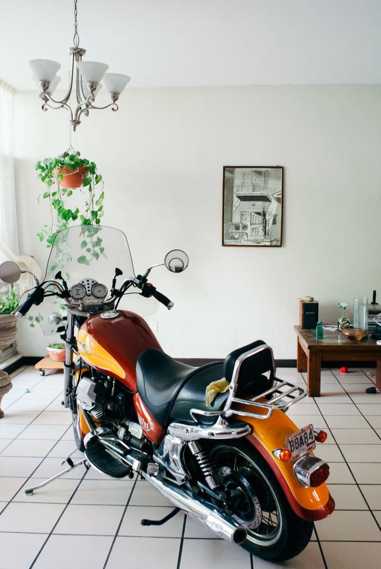 Carmen Argote: Motoguzzi motorcycle in the living room of the artist's father's home in Guadalajara, Mexico.