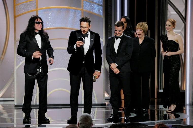 Image: James Franco accept an award at the Golden Globes