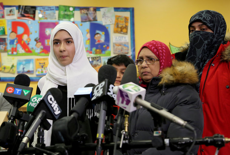 Image: Khawlah Noman, 11, speaks to reporters with her mother at Pauline Johnson Junior Public School, after she told police that a man cut her hijab with scissors in Toronto, Ontario, Canada on Jan. 12, 2018.