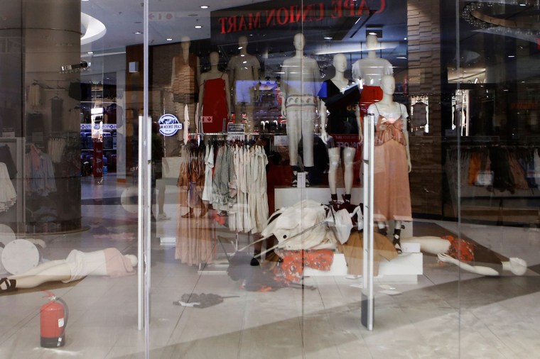 Image: An H&amp;M clothing store is closed after members the Economic Freedom Fighters (EFF) opposition party stormed the store in protest of a alleged racist slogan printed on a hoodie that caused uproar on social media, in Sandton City shopping mall in Joha