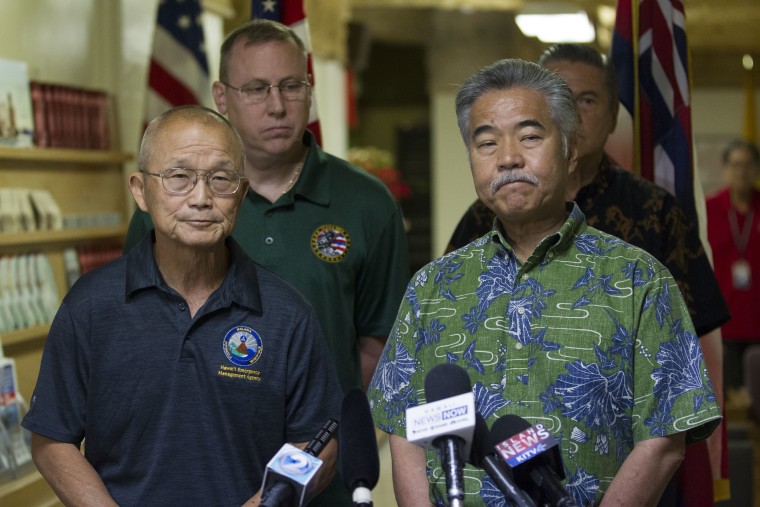 Hawaii Emergency Management Agency Administrator Vern Miyagi, left, and Gov. David Ige address the media after a mistaken alert warned residents of an imminent ballistic missile test Saturday morning.