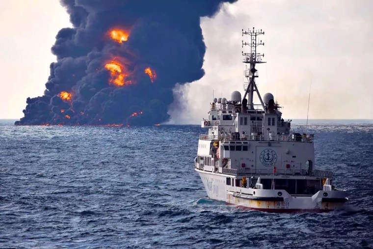 Image: Smoke and flames rise from the burning Iranian oil tanker "Sanchi" at sea off the coast of eastern China on Jan. 14, 2018.