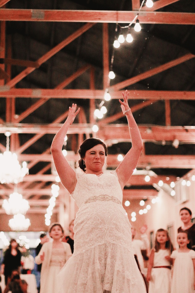Baby sitter includes 15 of her adorable charges in her wedding
