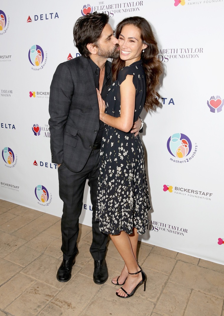 John Stamos and Caitlin McHugh attend The Elizabeth Taylor AIDS Foundation and mothers2mothers dinner in October.