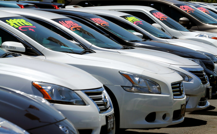 Image: Automobiles are shown for sale at a car dealership in Carlsbad, California