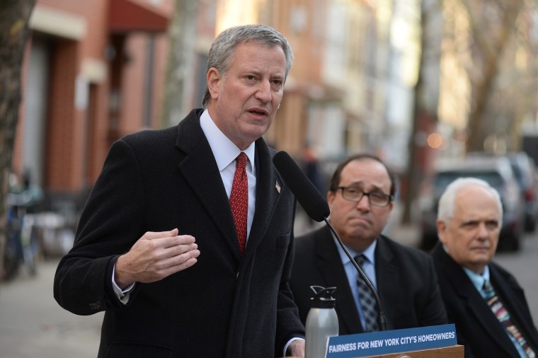 Mayor Bill de Blasio holds a press conference on the streets in the Greenpoint section of Brooklyn to applaud the decision from the New York Court of Appeals to uphold the Water Board's issuance of credits to homeowners on Dec. 20, 2017.