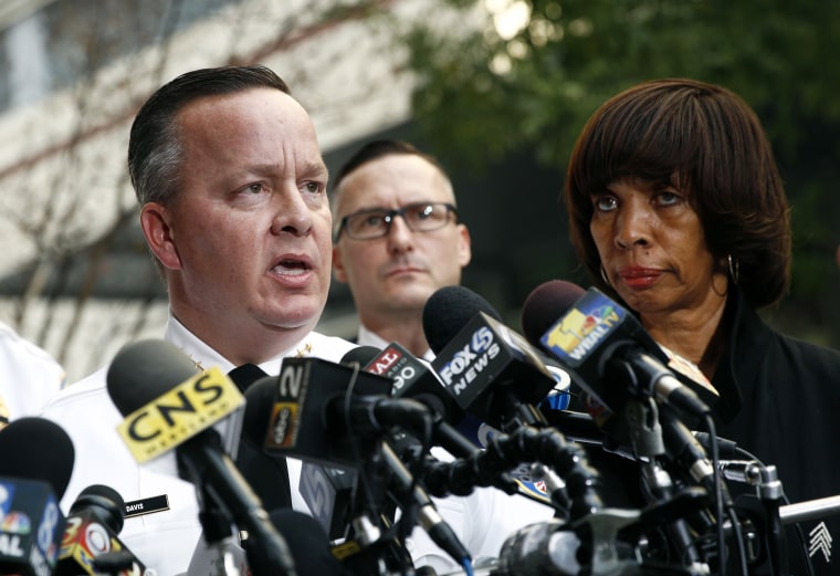 Image: Baltimore Police Department Commissioner Kevin Davis and Mayor Catherine Pugh