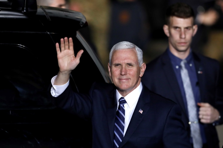 Image: Vice President Mike Pence waves after arriving at Ben Gurion International Airport