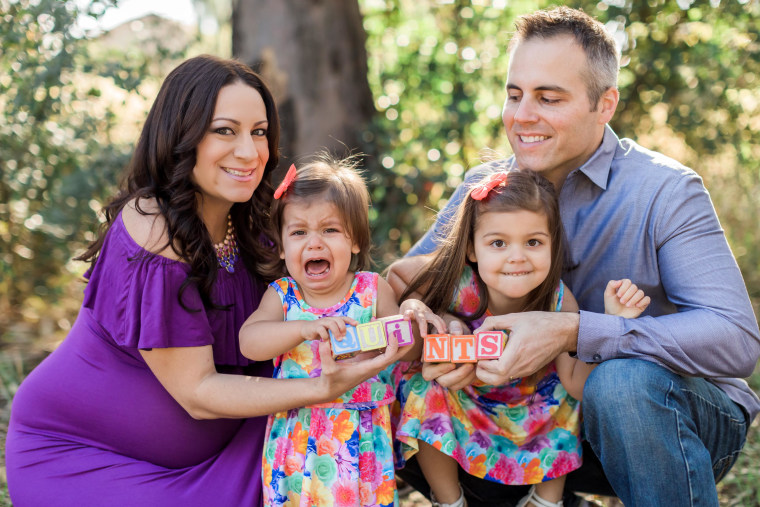 Amy and Chad Kempel, along with Savannah and a not-so-happy Avery, announcing big news last year!