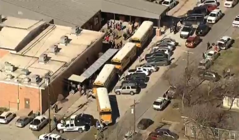 Image: Students are evacuated after a school shooting in Italy, Texas