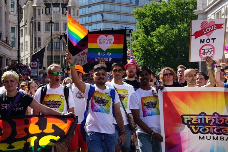 Members of Rainbow Voices Mumbai participating in the London Pride March in July 2017. Choir director David Williamson is second from left, and Ashish Pandya is in the middle holding a rainbow flag.