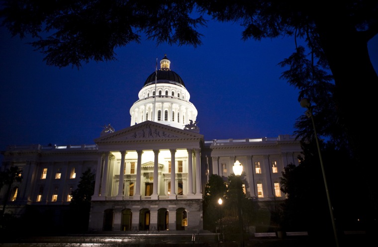 Image: Exterior shot of State Capitol is seen as California legislators work late into the night to pass $40 billion budget in building in Sacramento
