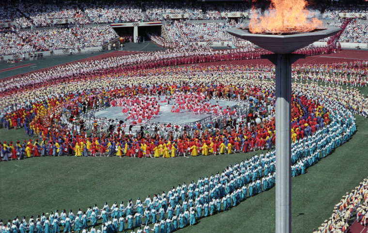 Image: Athletes from a 160 nations parade during the Olympics opening ceremony in 1988