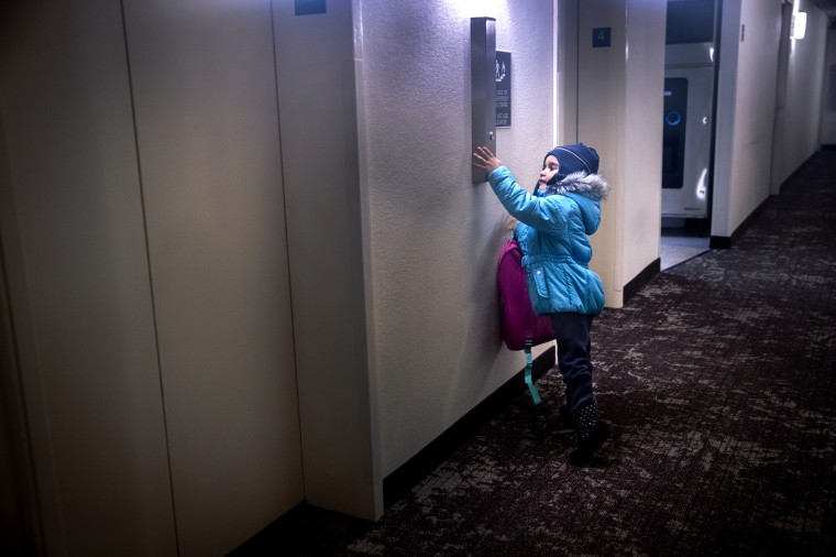 Image: Puerto Rican families escaping Maria build unlikely community in Connecticut hotel