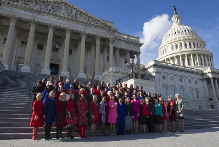 Image: House Minority Leader Nancy Pelosi of Calif. poses with women members of the House