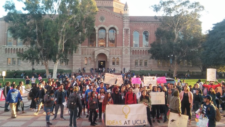 Students and others protest outside a Latino-focused forum featuring California's six candidates for governor held at University of California, Los Angeles on Jan. 25, 2018.