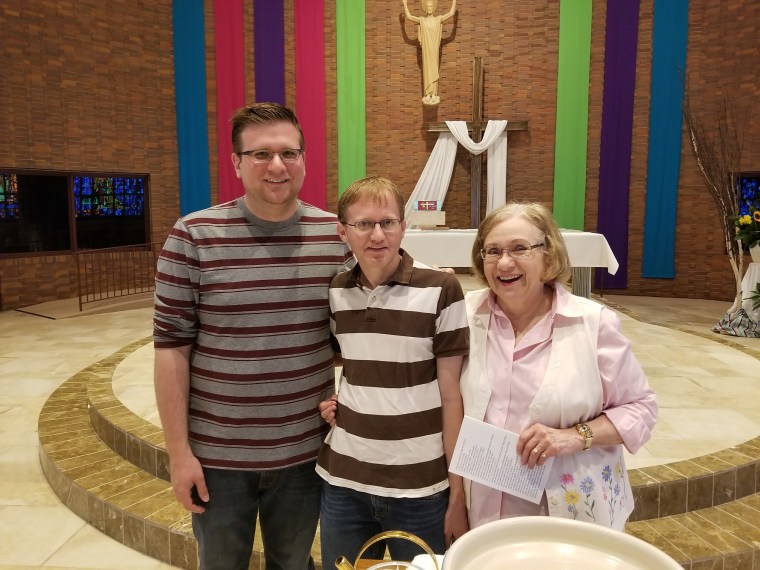 John Freml, left, with his husband and mother.