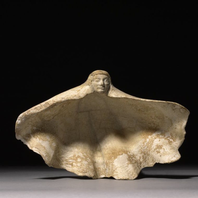 Tridacna shell carved