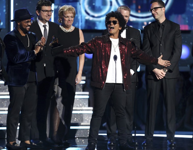 Image: Bruno Mars accepts the award for record of the year