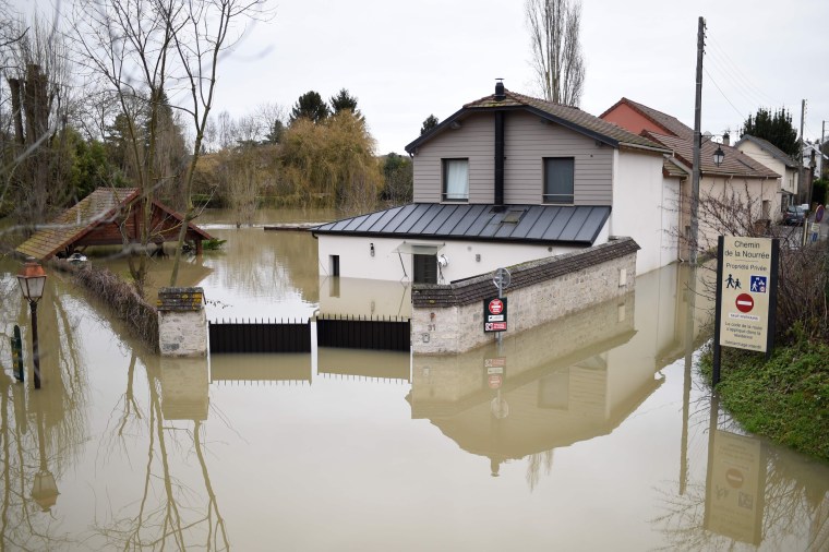 Image: A home is submerged in floodwater from the Seine river