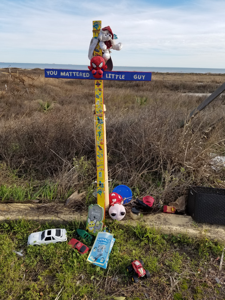 A memorial for Little Jacob on Galveston Beach near where his body was found.