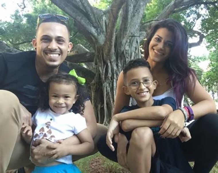Emmanuel Ortiz-Nazario, his wife Cristalimar Torres-Rodriguez and their two children.