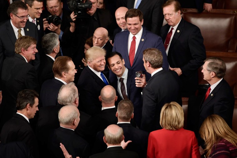 Image: Trump poses for a selfie after delivering the State of the Union address