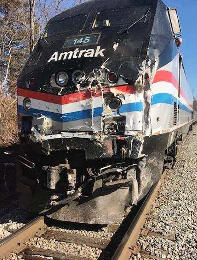 Image: Train carrying GOP members hits truck