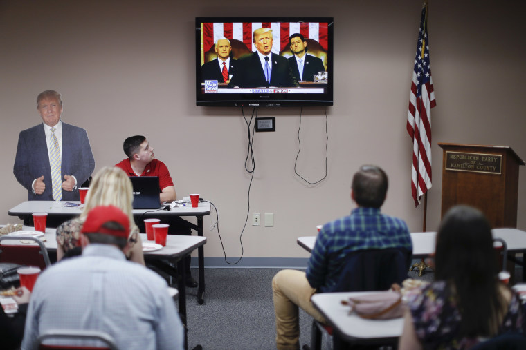 Image: Supporters watch President Donald Trump speak at a State of the Union watch party