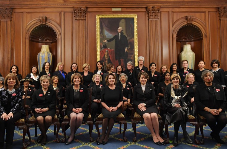 Image: Pelosi and other female Democratic lawmakers pose for a photo ahead of President Donald Trump's State of the Union address