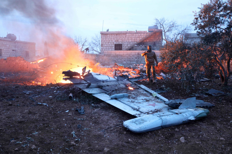 Image: Smoke billows from the site of a downed Sukhoi-25 fighter jet in Syria's northwest province of Idlib on Feb. 3, 2017.