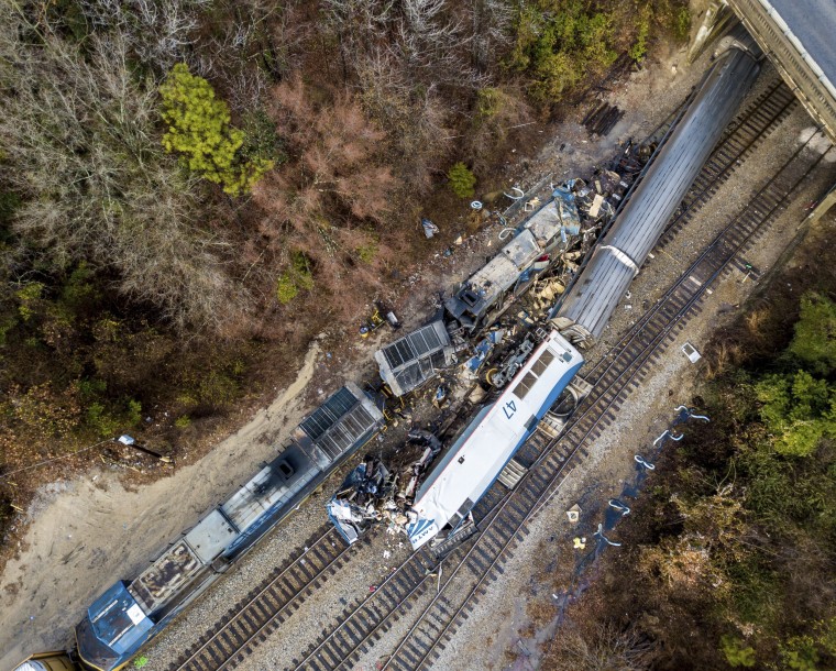 Image: An Amtrak train, bottom right, and a CSX freight train, top left, crashed in Cayce