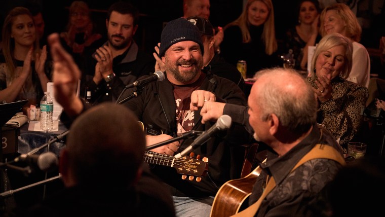 Kent Blazy and Garth Brooks perform at the Bluebird Cafe in Nashville on Feb. 1.