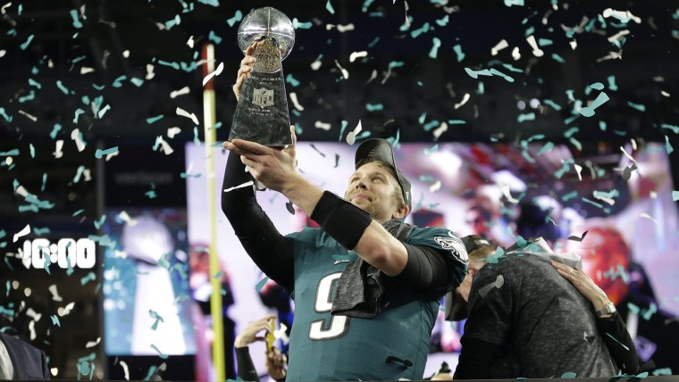 Image: Philadelphia Eagles quarterback Nick Foles (9) with the Vince Lombardi Trophy after winning Super Bowl LII between the Philadelphia Eagles and New England Patriots at U.S. Bank Stadium in Minneapolis, Feb. 4, 2018. The Eagles won 41-33.