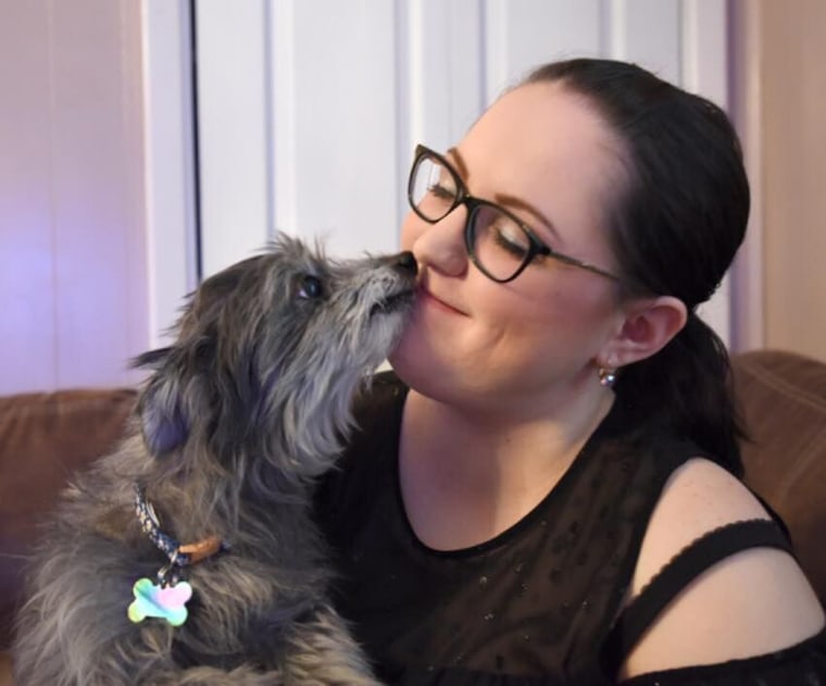 woman adopts dog her parents gave up to shelter a decade earlier