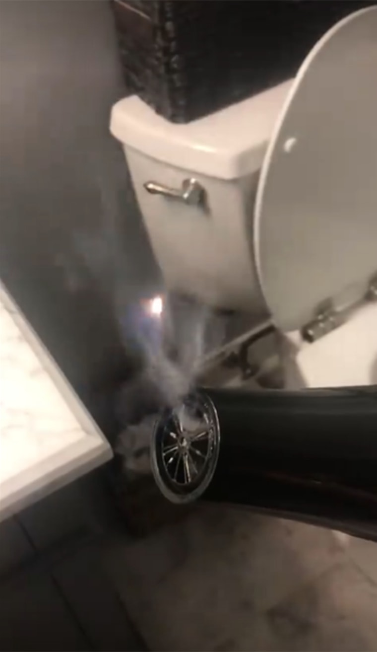 The dryer smoked and flamed in the terrifying incident.