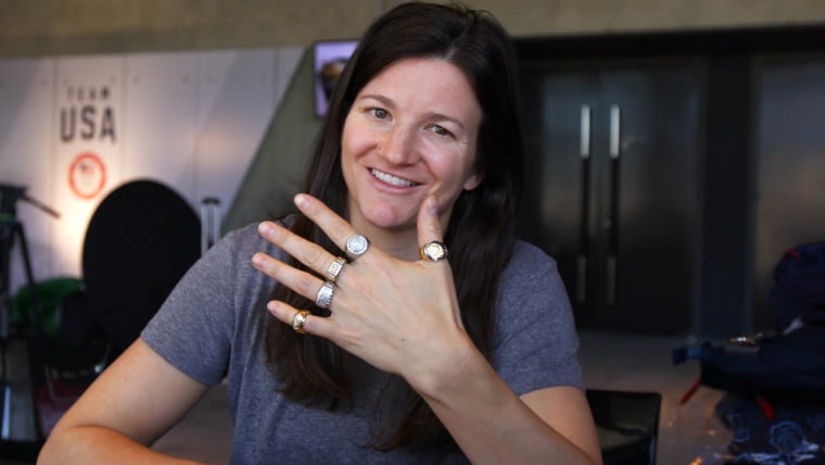 Snowboarder Kelly Clark showed off her Olympic rings for the camera.