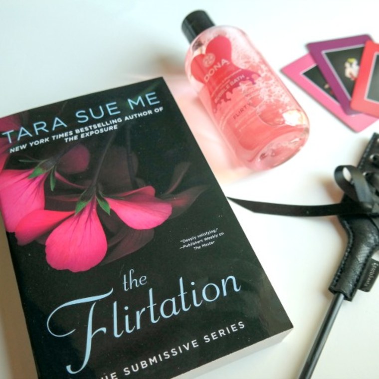 The "Hurts So Good" Box included the novel "'The Flirtation' by Tara Sue Me and a crop.
