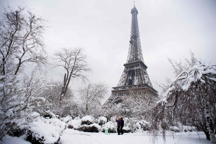 People walk through the Champ de Mars garden on Feb. 7.