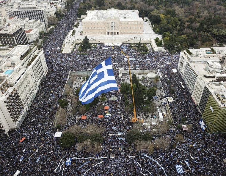 Protesters gather at Syntagma square in front of the Greek Parliament during a rally in Athens on Feb. 4. Well over 100,000 protesters from across Greece converged Sunday on Athens' main square to protest a potential Greek compromise in a dispute with neighboring Macedonia over the former Yugoslav republic's official name.