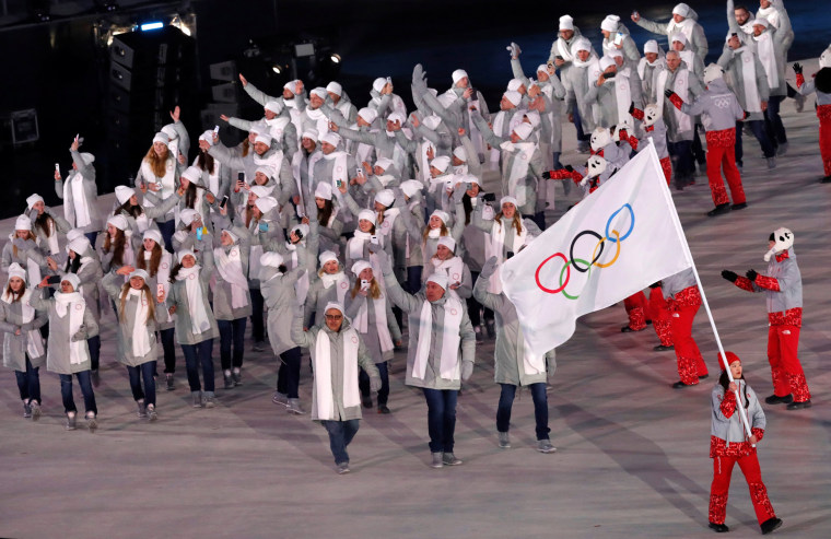 Russian athletes march under a neutral flag. 
The International Olympic Committee had banned Russia because of a massive doping scheme at the 2014 Sochi Games, but gave individual athletes the chance to apply for admission to compete as \"Olympic Athletes from Russia.\"