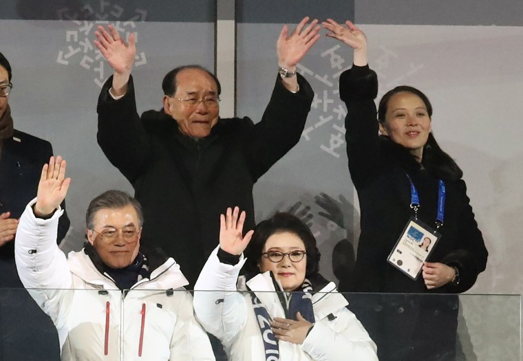 Kim Yo Jong waves as she stands next to North Korea's ceremonial head of state Kim Yong Nam and behind South Korean President Moon Jae-in during the opening ceremony of the Pyeongchang 2018 Winter Olympic Games on Feb. 9, 2018.